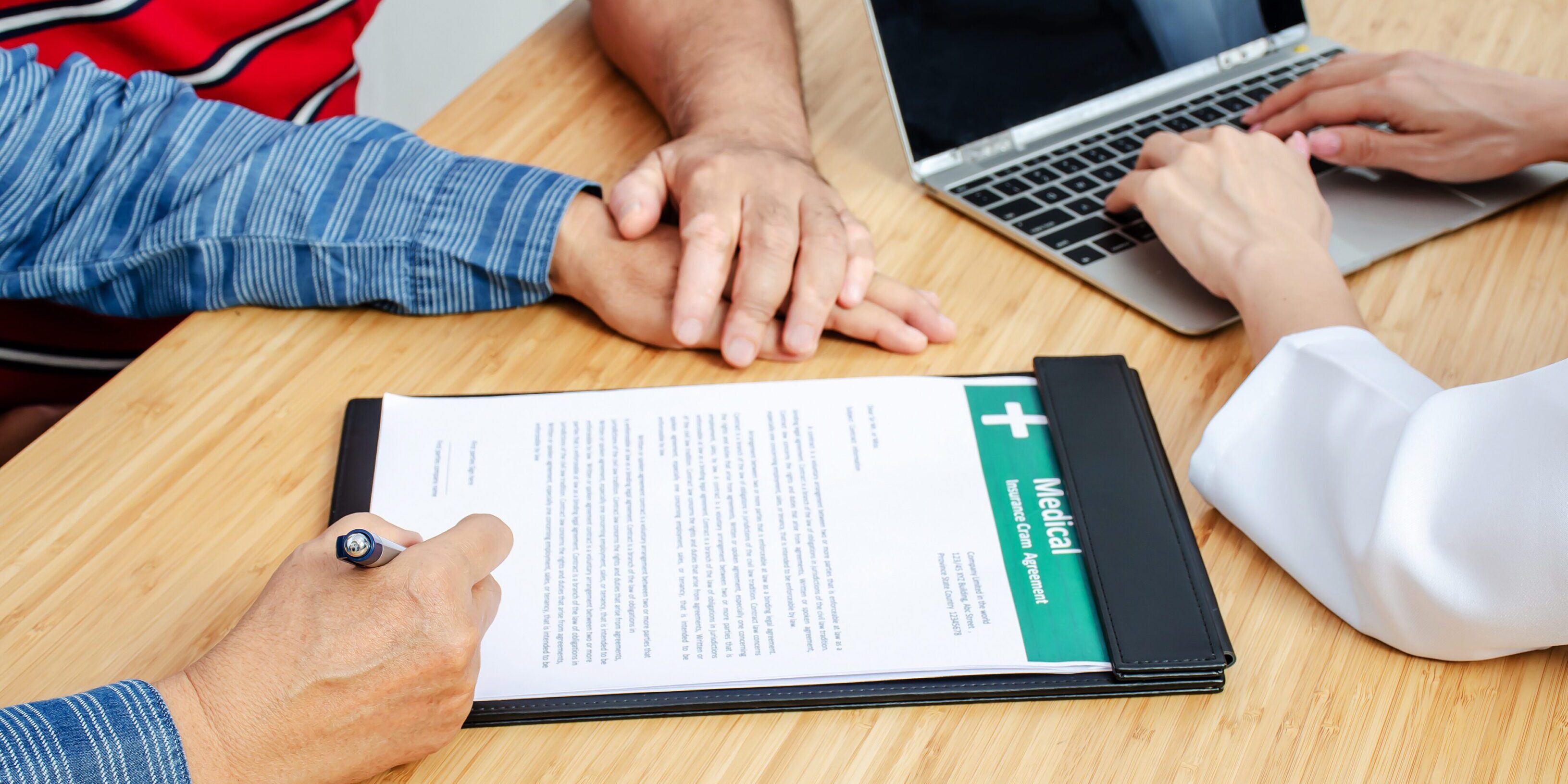 Couple senior patient in office filling out medical document form on a clipboard with doctor, Patient listening receiving in medical clinic hospital, Healthcare, insurance and medicine concept